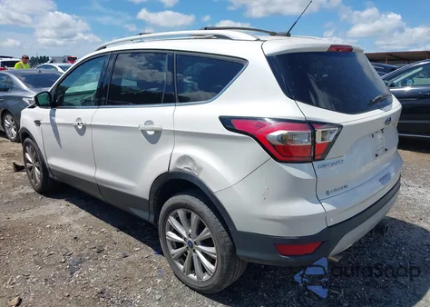 2017 Ford Escape Titanium z USA, uszkodzony, nr VIN 1FMCU0J98HUB56334
